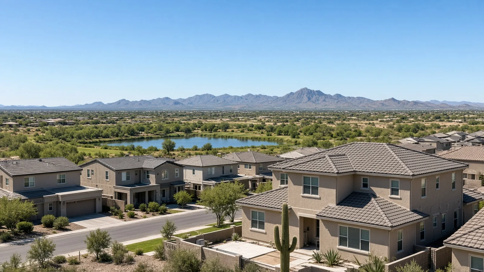 Peoria northwest Valley neighborhood street with production homes and open sky